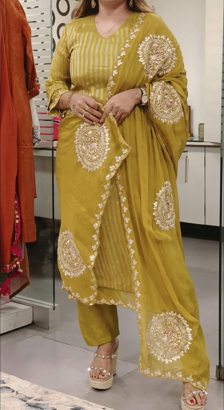 Strip straight tissue suit with circle handwork detailing