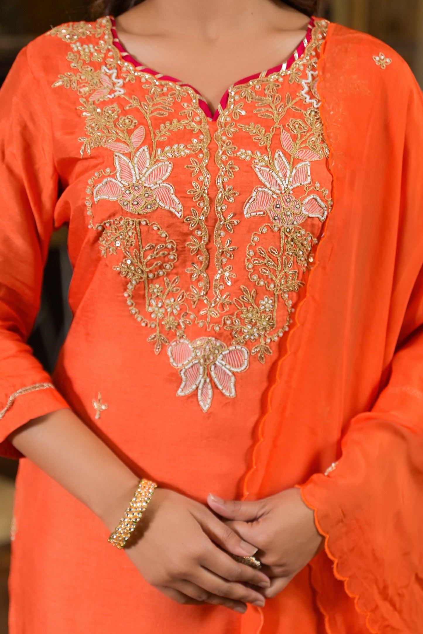 Orange silk hand work suit