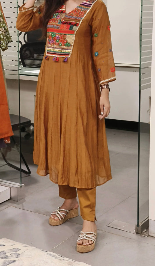 Elegance Redefined Mul Chanderi A-Line Kurta Set with Exquisite Multicolor Embroidery & pants