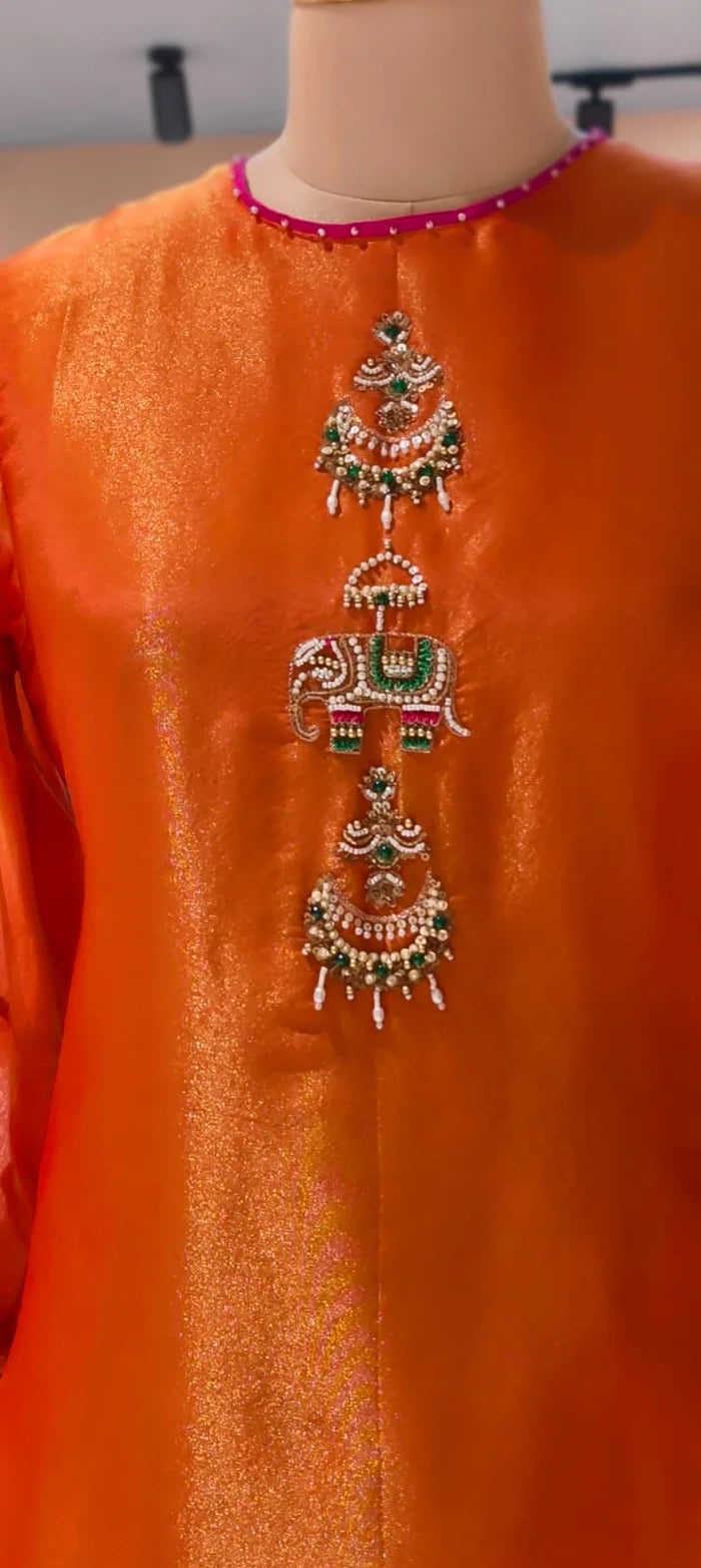 Jewel orange elephant handwork premium tissue suit with organza Dupatta & tulip pants
