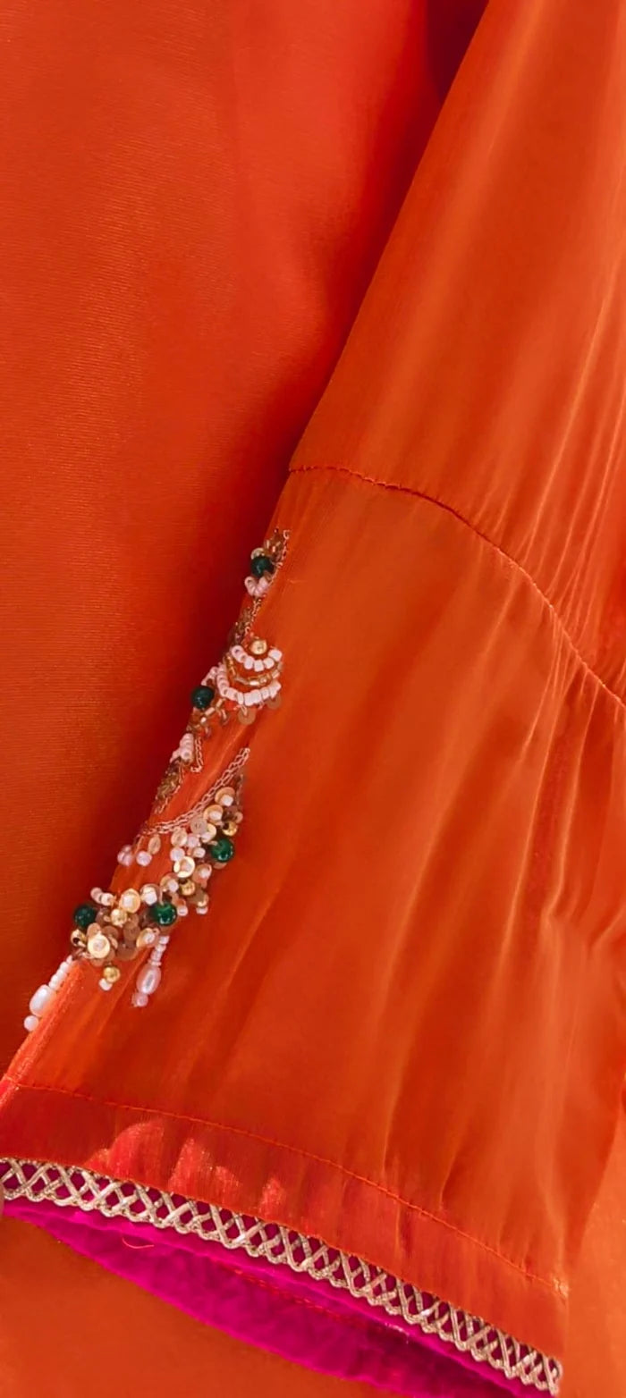 Jewel orange elephant handwork premium tissue suit with organza Dupatta & tulip pants