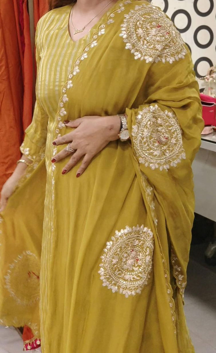 Strip straight tissue suit with circle handwork detailing