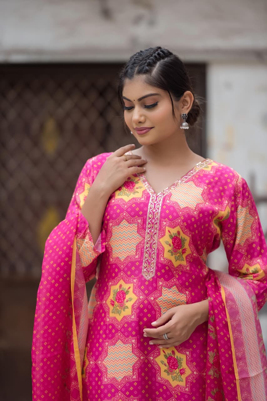Pink muslin silk suit with organza Dupatta and muslin pants