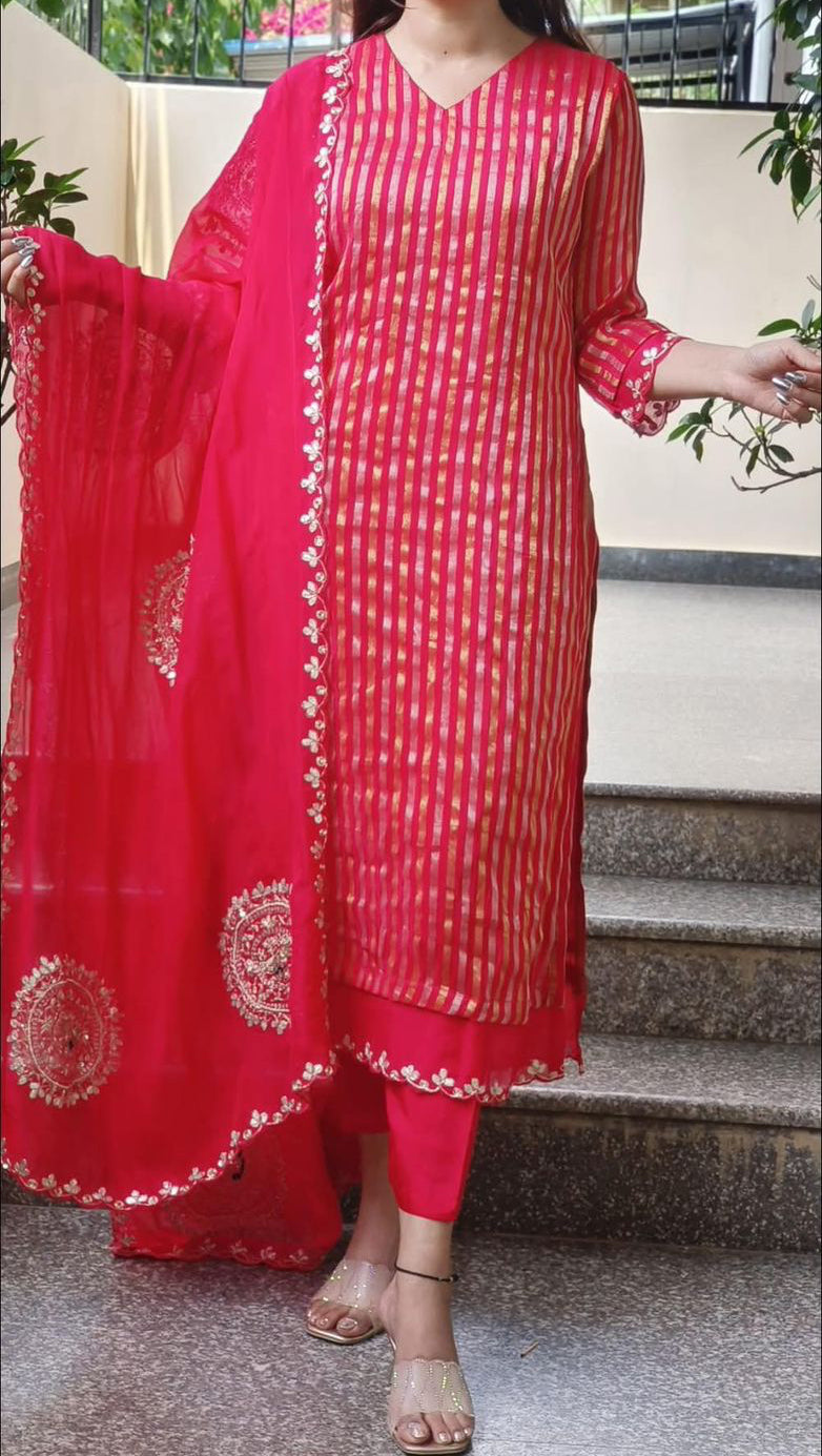 Strip straight tissue suit with circle handwork detailing