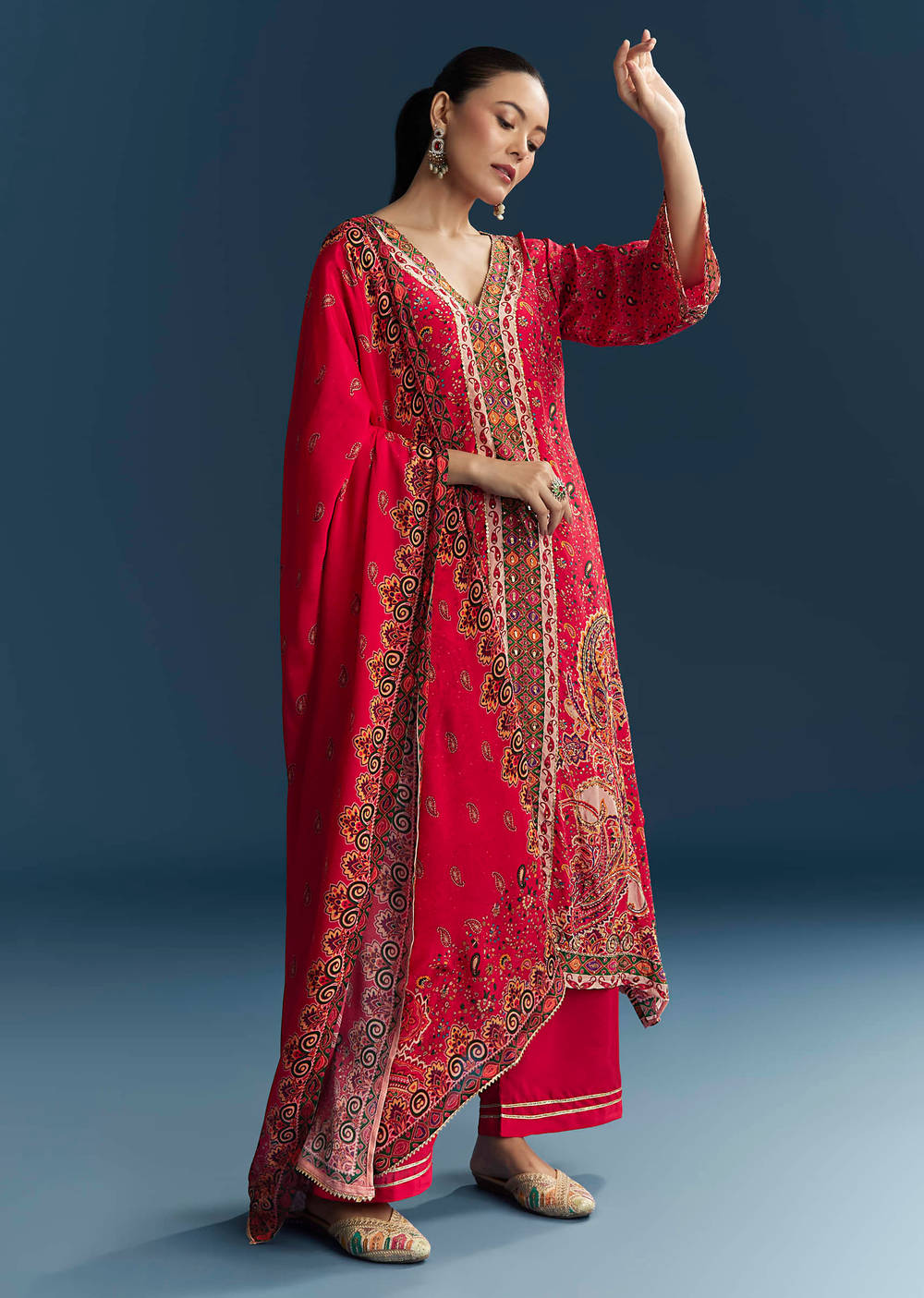 Red Mughal print crepe suit