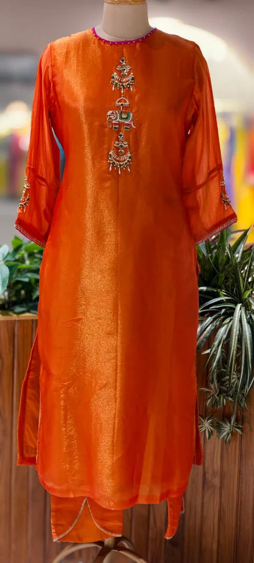 Jewel orange elephant handwork premium tissue suit with organza Dupatta & tulip pants