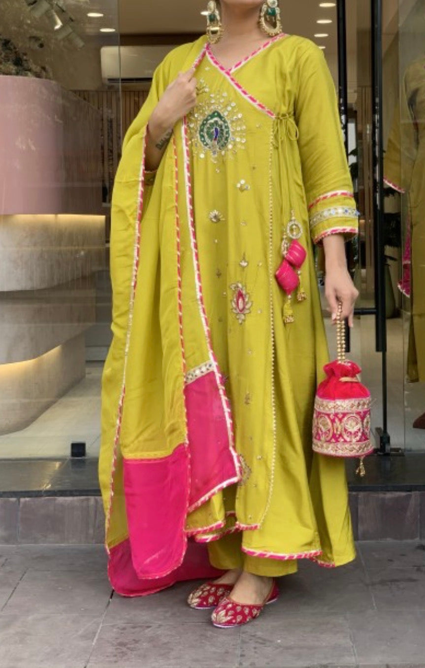 Silk angrakh peocoak anrakali with gota detailing paired with organza dup & silk pants