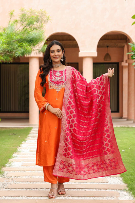 Orange silk suit with banaras Dupatta