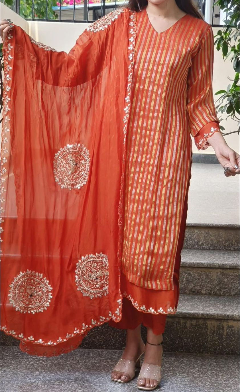 Strip straight tissue suit with circle handwork detailing