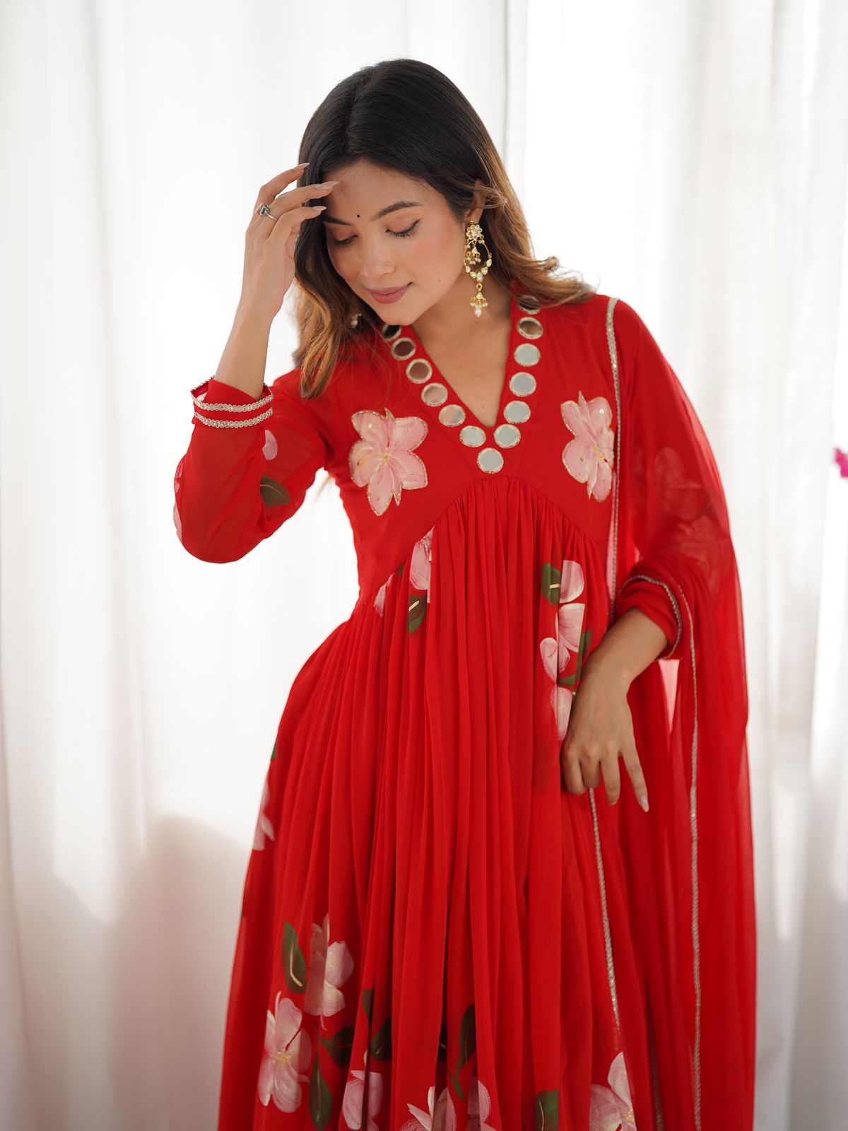 Chiffon real mirror Anarkali with handpainted detailing. Handwork on yoke.