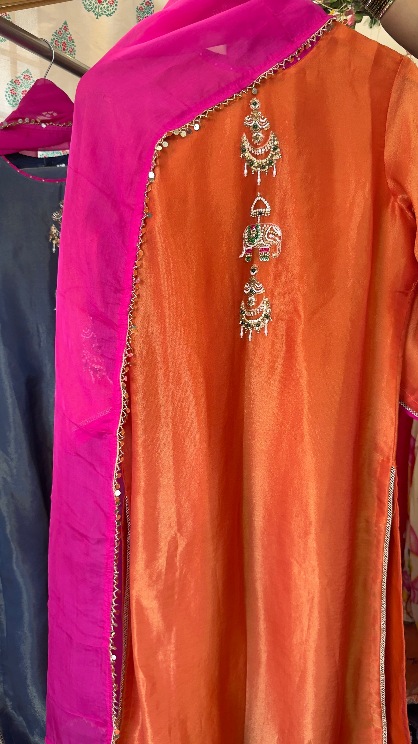 Jewel orange elephant handwork premium tissue suit with organza Dupatta & tulip pants