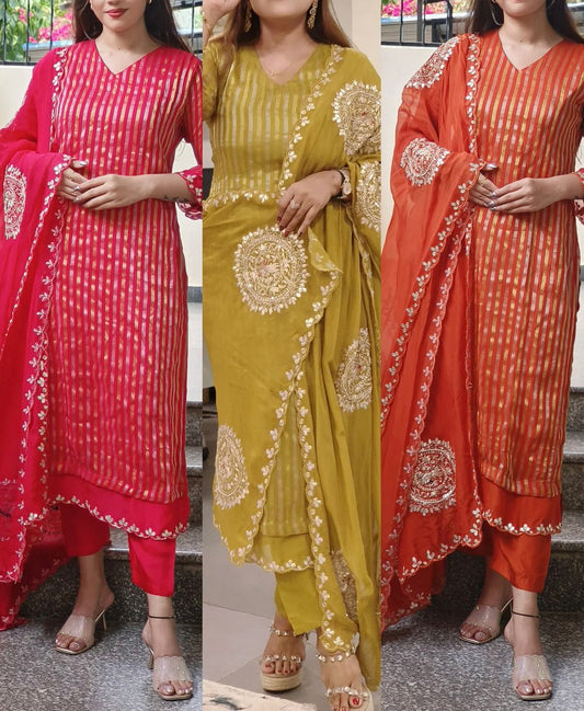 Strip straight tissue suit with circle handwork detailing