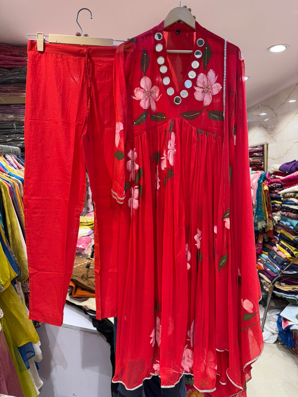 Chiffon real mirror Anarkali with handpainted detailing. Handwork on yoke.