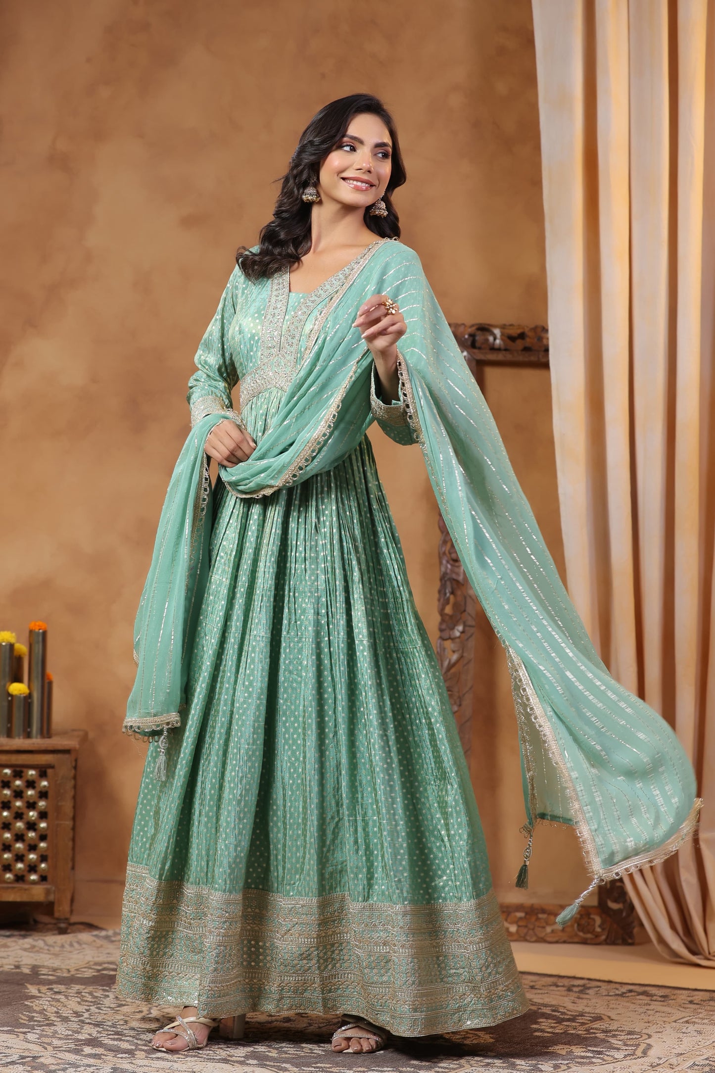 Metallic green tissue gown