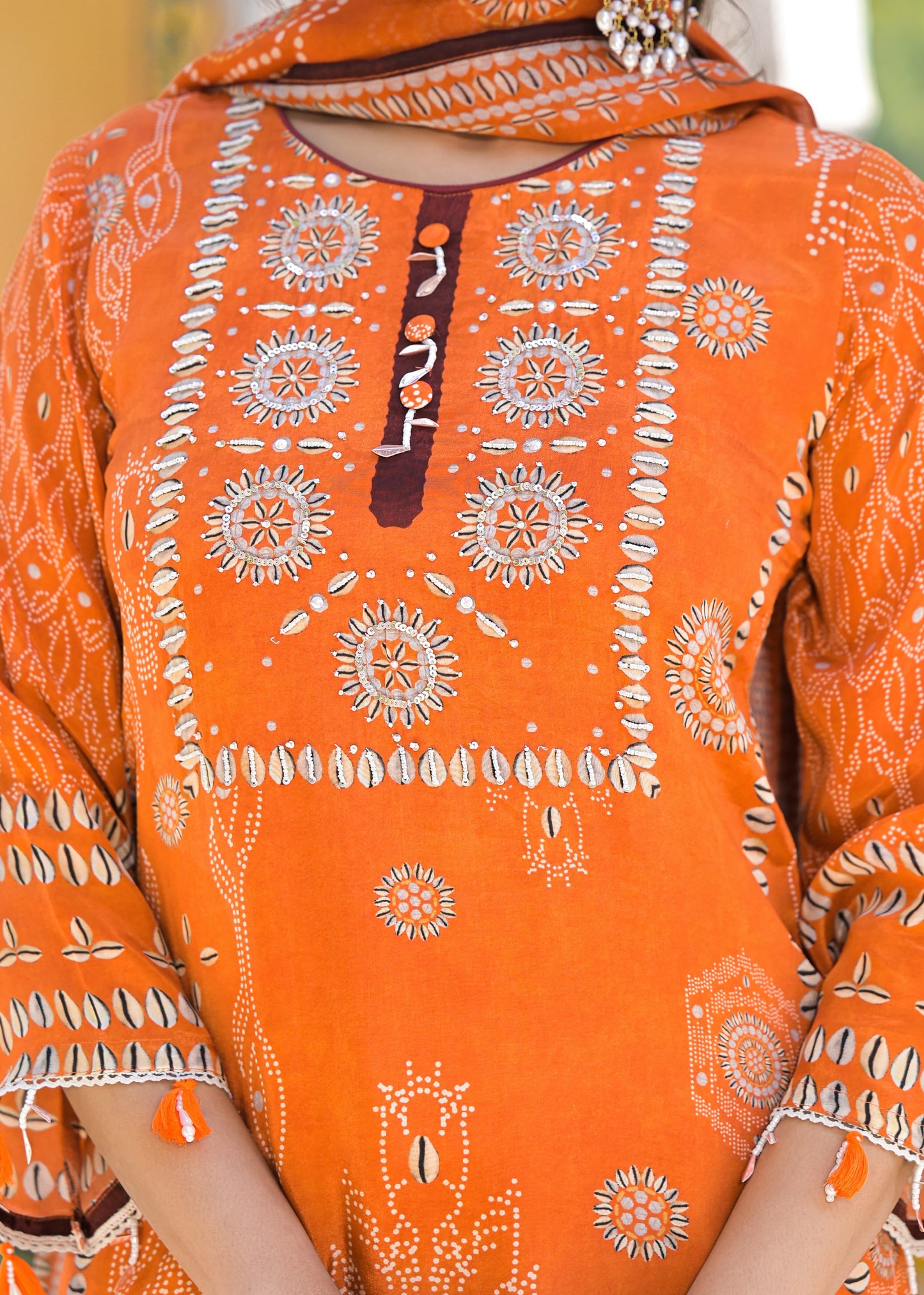 Orange crepe shell suit