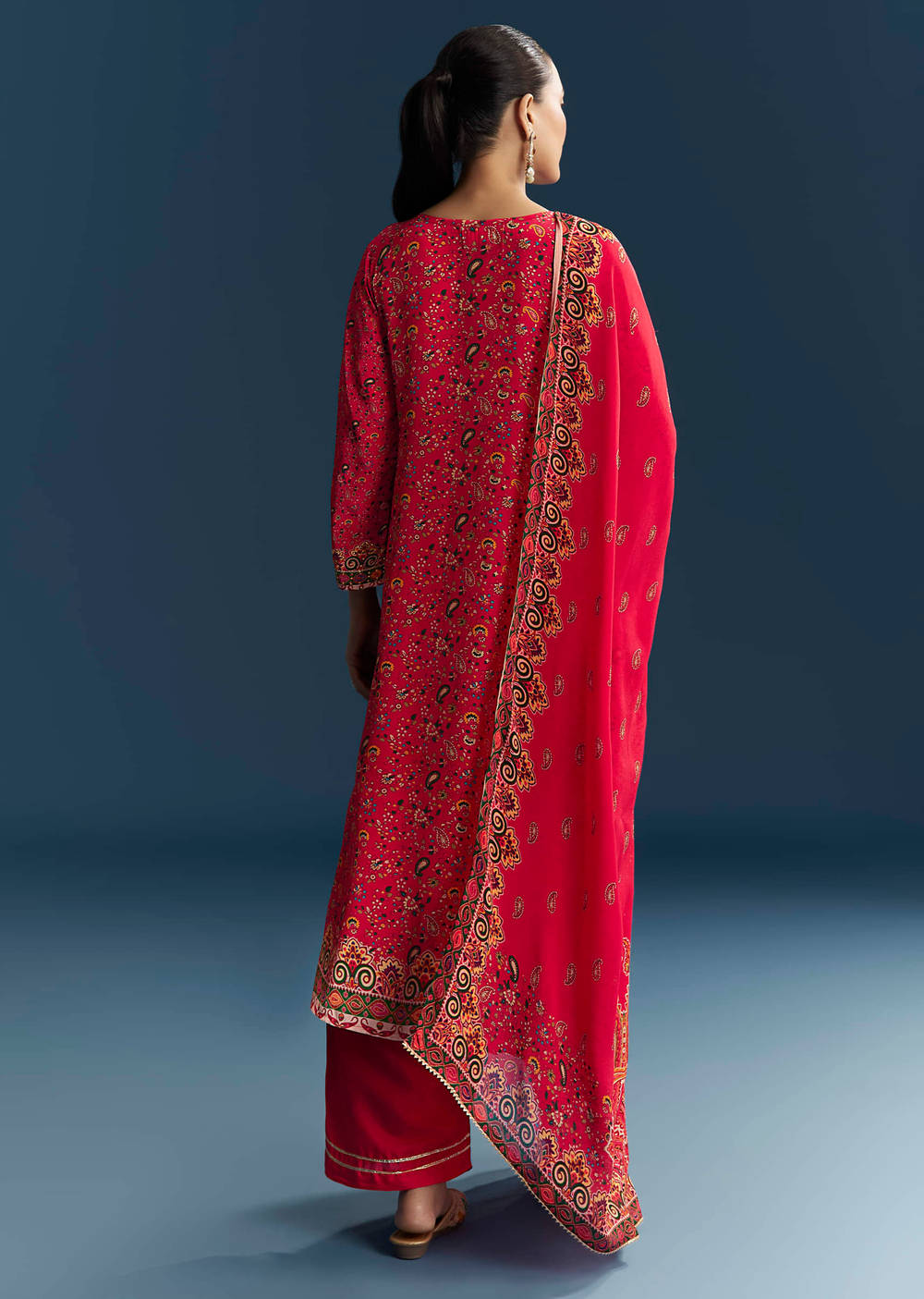 Red Mughal print crepe suit